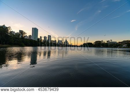 Igapo Lake At Sunset, Londrina - Pr, Brazil. Beautiful City Lake Surrounded By Trees, With Calm Wate