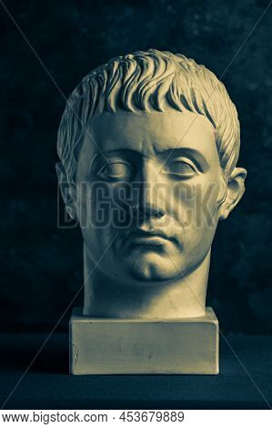 Bronze Color Gypsum Copy Of Ancient Statue Of Germanicus Julius Caesar Head For Artists On Black Bac