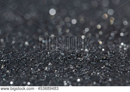Dark Grey Water Resistant Hydrophobic Flat Cloth With Rain Drops, Close-up Background With Selective