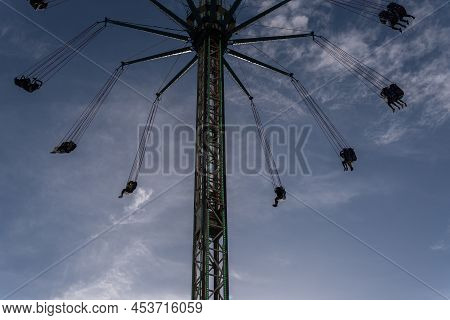 Palma De Mallorca, Spain; April 08 2022: Attractions And People At The Traditional Annual Fair, Fira