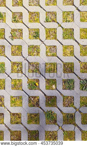 Texture With Gray Squares With Green Grass Inside The Squares Background Shining Sun Heat Summer Yel