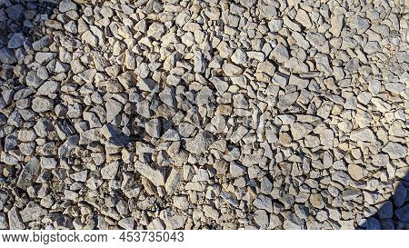 Many Stones Of Gray Color Lying On The Ground Granite In Spring Texture Background