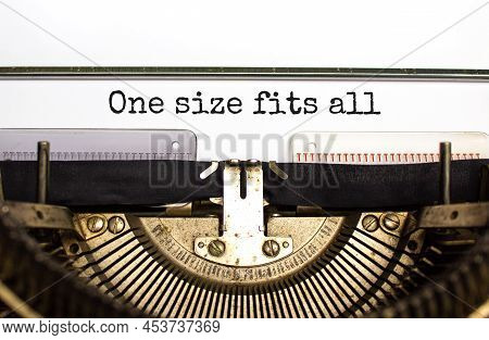 One Size Fits All Symbol. Concept Words One Size Fits All Typed On Retro Typewriter. Beautiful White