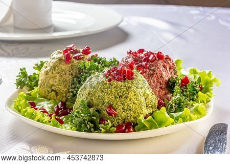 Pkhali Or Phali Is A Georgian Snack Made Of Beets, Nuts And Beans, Herbs, Garlic With Pomegranate Se