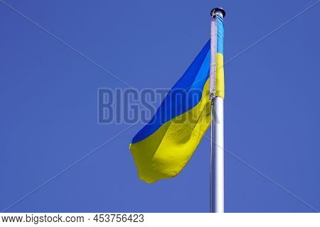 Flag Ukrainian National Country State Flag Of Ukraine Banner On White Matin Liberty  Blue Sky