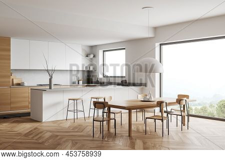 Corner View On Bright Kitchen Room Interior With Panoramic Window, Island With Barstools, Dining Tab