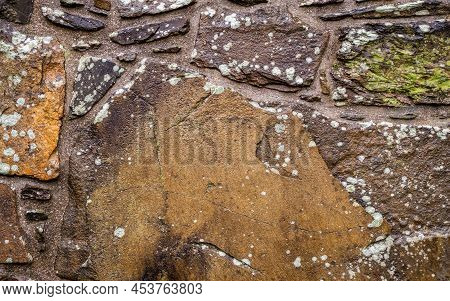 Abstract Of An Old Scottish Castle Stone Wall, With Moss Growing