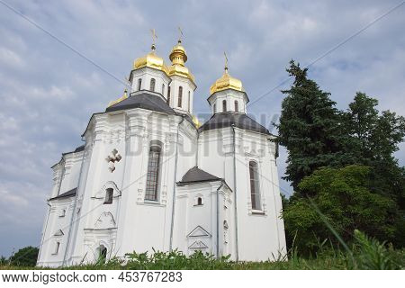 Cloudy Sky Over The Ancient Orthodox Church Of St. Catherine In The Ukrainian City Of Chernihiv. An 