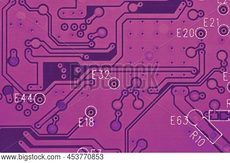 Hard Drive Hdd Printed Wiring Board Pwb Closeup. Conductive Patterns. Dark Pink Pc Background. Purpl