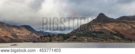 Beautiful Winter Landscape View Along Loch Leven Towards Snowcapped Mountains In Distance With Drama