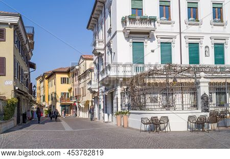 Peschiera Del Garda, Italy - March 21, 2022: A Street Of The Old Town With Restaurants And Stores