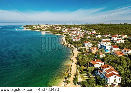 Aerial Top View Of Village Petrcane, Croatia. Touristic Background With Blue Sea, Coastline And Red 