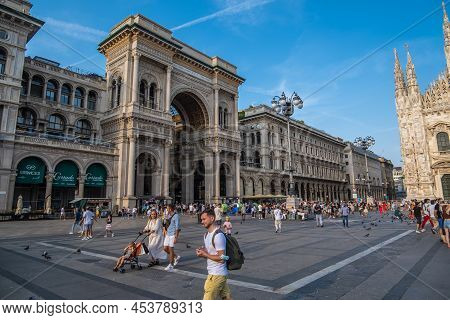 Milan, Italy - August 22, 2021: View Of Tourists Strolling Through Milan Metropolitan Area
