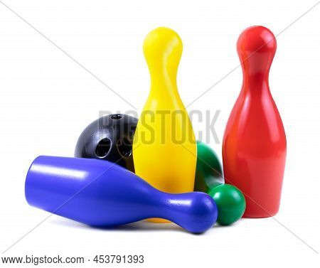 Set Of Collored Bowling Pins And Ball Isolated On A White Background. Skittles Isolated On A White B