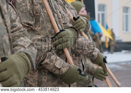 Armed Forces Of Ukraine National Guard. Soldiers Of Ukrainian Army Are Standing In The Military Unif