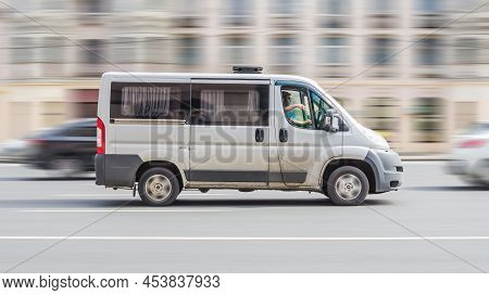 Ram Promaster 1500 Window Or Glazed Van At The City Street, Side View. Third Generation Vehicle Of L