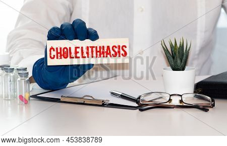 Cholelithiasis Gallstones Word, Medical Term Word With Medical Concepts In Blackboard And Medical Eq