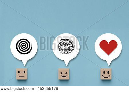 Wooden Cube With Unhappy Face With A Tangle Of Thoughts In Its Head , Wood Block With Emotion Smile 