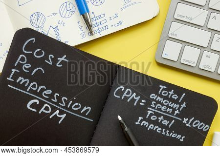 Handwritten Cpm Formula In The Notepad. Cost Per Impression.