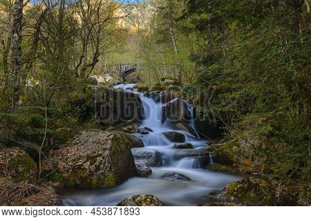 Waterfall At Madriu Perafita Claror Valley In Andorra,unesco World Heritage Site