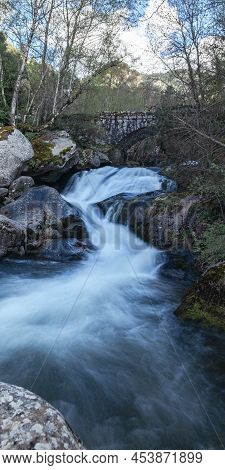 Waterfall At Madriu Perafita Claror Valley In Andorra,unesco World Heritage Site