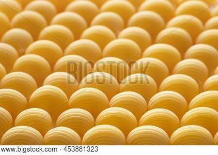 Raw Pipe Rigate Pasta. Italian Pasta Pattern, Food Background Or Texture Close Up
