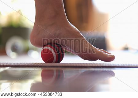Close-up Of Myofascial Release Of Hyper-movable Muscles Of Foot With Massage Ball. Prevention Of Leg