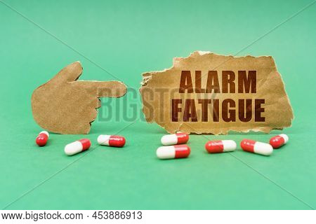 Medical Concept. On The Green Surface Of The Tablet And A Hand Pointing To A Sign With The Inscripti