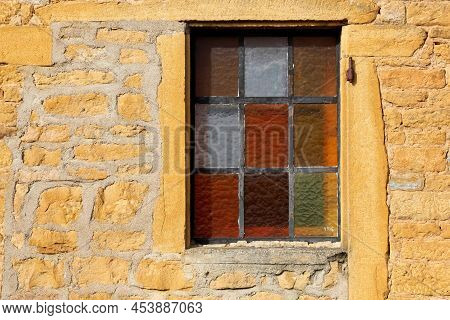 Typical Wall Of Golden Stones In The Village Of Theize In Beaujolais, France
