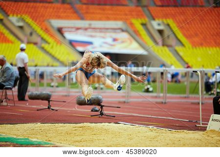 MOSCOW - JUN 11: Female athlete in long jump place at Grand Sports Arena of Luzhniki OC during International athletics competitions IAAF World Challenge Moscow Challenge, Jun 11, 2012, Moscow, Russia.