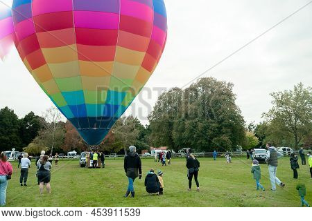 Masternon, New Zealand April, 22 2022 - People Attending Hot Air Balloon Festival In Masterton New Z