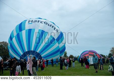 Masternon, New Zealand April, 22 2022 - People Attending Hot Air Balloon Festival In Masterton New Z