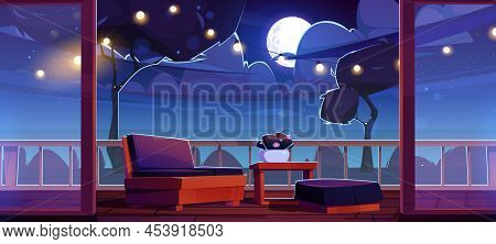 Home Terrace At Night, Hotel Or Cafe Outdoor Patio With Furniture, Light Garland And Dark Garden Wit