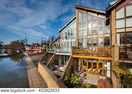 Boathouse Court, Cambridge, England - Jan 19 2017: City Centre Townhouses Along The River Cam Adjace