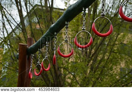 Outdoor Sports Ground For Children And Adults. Handcuffing, Climbing Rope. Parallel Bars And Pull-ou