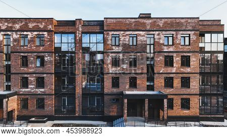 A New Brick House Stained With White Efflorescence, A Crystalline Of Salt, Formed Due To Water Being