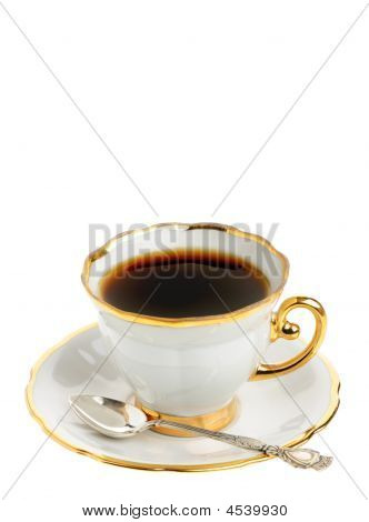 Stilfuld kaffekop med sølvske
