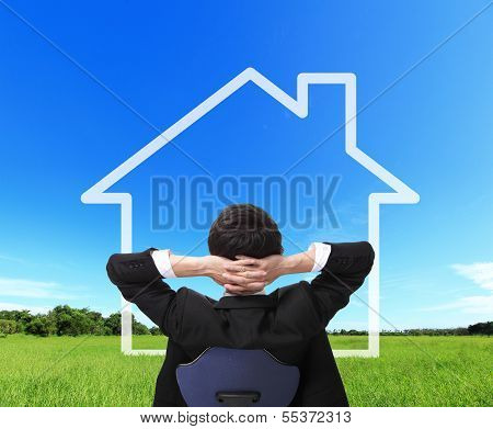 Business Man Sit And Dreaming A House