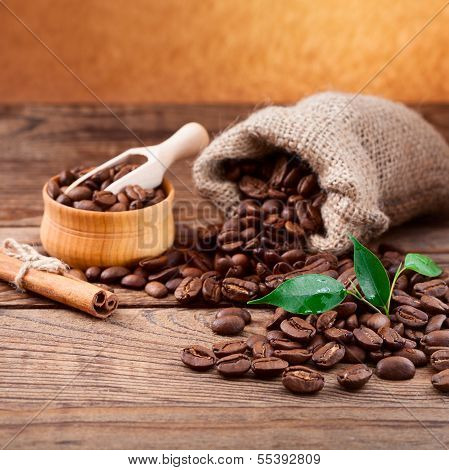 Coffee cup and saucer on  wooden table.