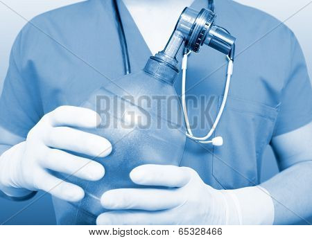 Doctor Holding A Breathing Bag