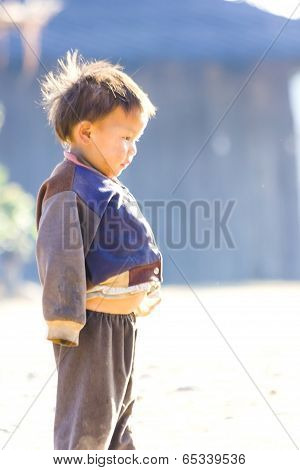 Children Warm Oneself In The Winter Season.