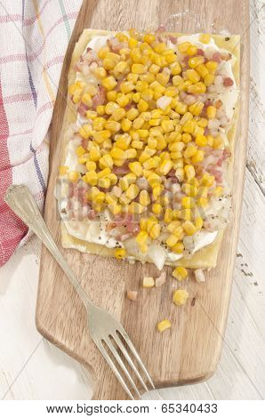 Tarte Flambee On A Wooden Board