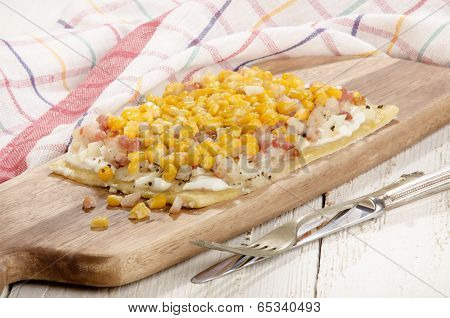 Tarte Flambee On A Wooden Board