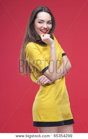 Woman half length on red background