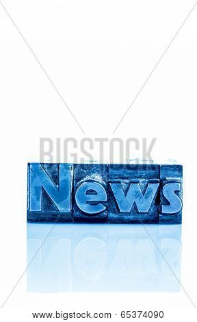 the word news written with lead letters. symbolic photo for newsletters, newspapers and information