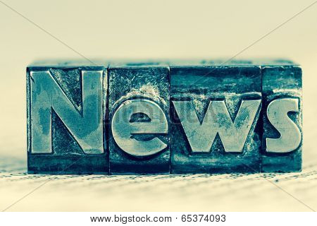 the word news written with lead letters. symbolic photo for newsletters, newspapers and information