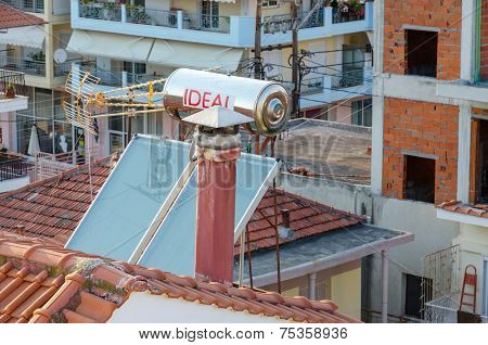 Solar Collectors On The Roof Of The House, Greece