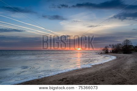 Sunset above frozen sea