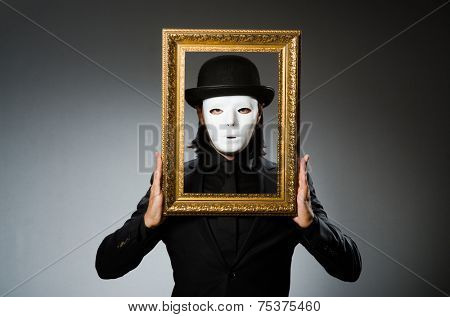 Funny concept with theatrical mask