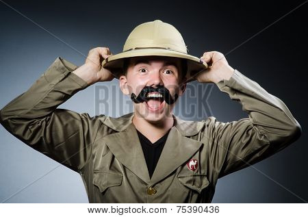 Man in safari hat in hunting concept
